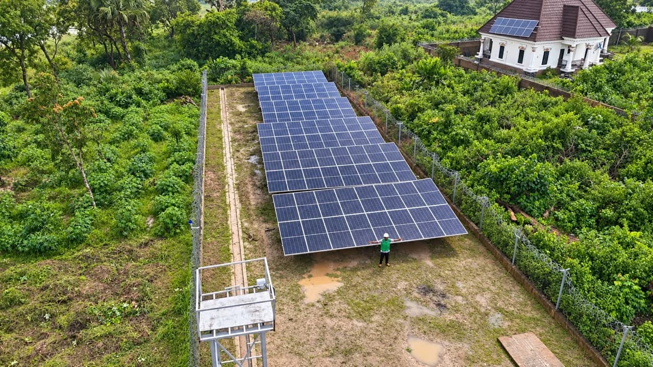 Aerial view of a fenced solar mini-grid installed by ACOB Lighting