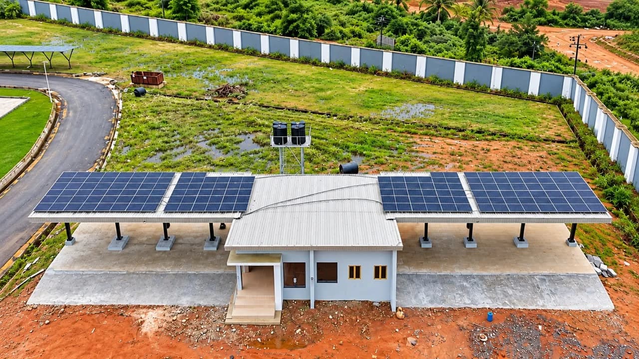 Aerial view of the charging station with solar panels on its canopy roof